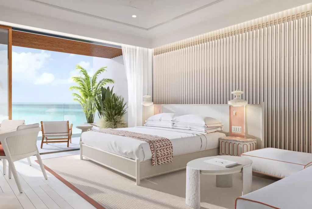 The Setai St. Marteen residence room with bedroom and balcony overlooking water